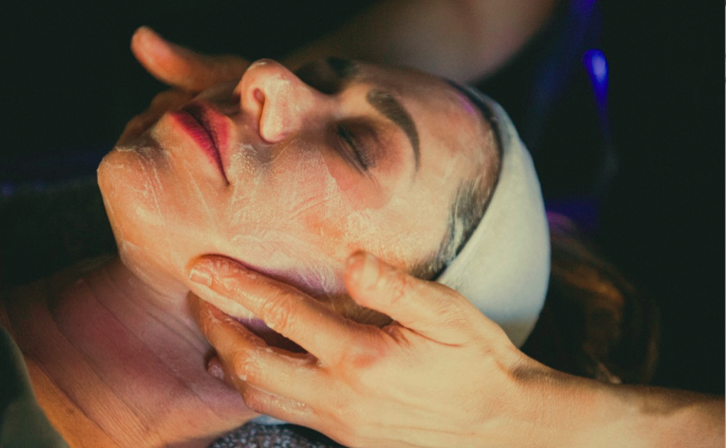 Client receiving a luxury facial treatment at Spa La La in Austin