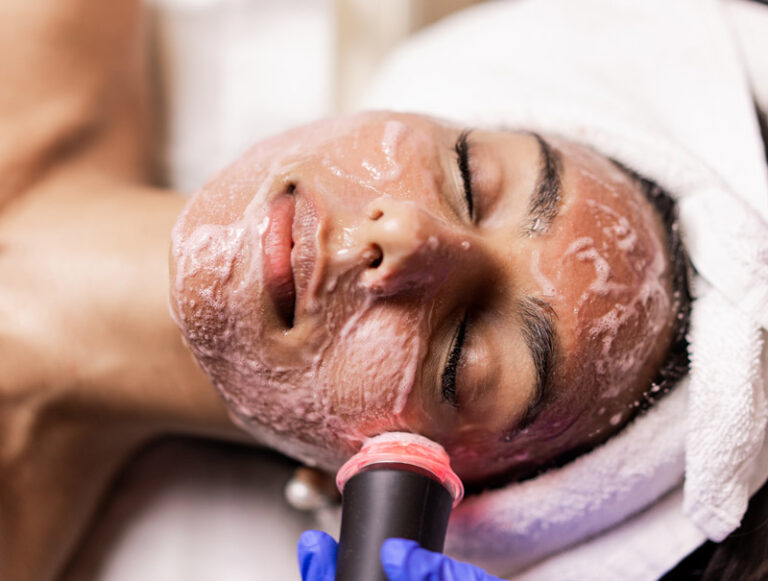 Client receiving an OxyGeneo oxygenating facial at Spa La La Aesthetics & Wellness in Austin, TX.